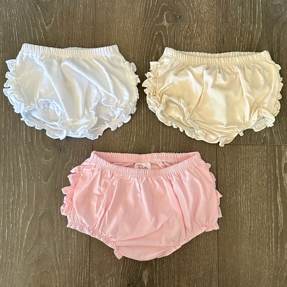 Ruffle Butts Baby Diaper Covers in White, Cream, and Light Pink